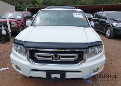 2010 Honda Ridgeline Rtl z USA, uszkodzony, nr VIN 5FPYK1F58AB006130